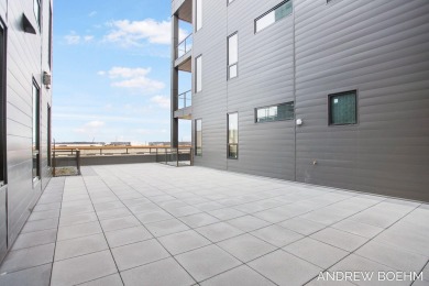 Luxury Downtown Living with Custom Finishes and Lake Views