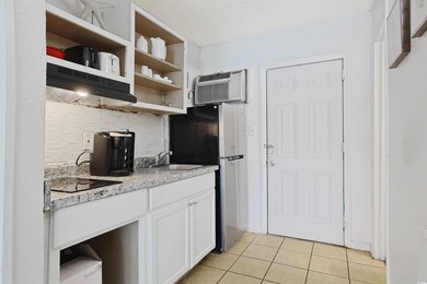 This amazing first floor unit is located just steps from the