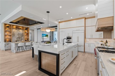 Overlooking the pristine sands of Fort Myers Beach, this BRAND