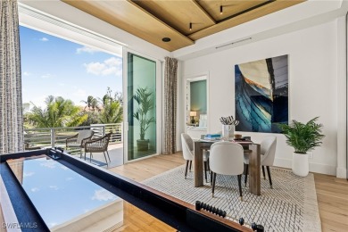 Overlooking the pristine sands of Fort Myers Beach, this BRAND