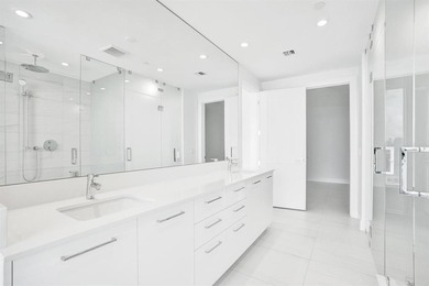 Experience elevated coastal living in this stunning residence