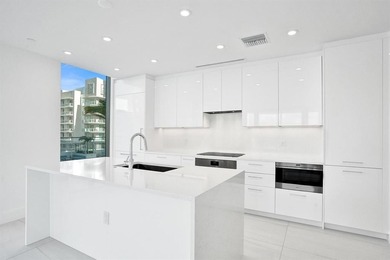 Experience elevated coastal living in this stunning residence