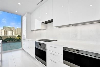 Experience elevated coastal living in this stunning residence