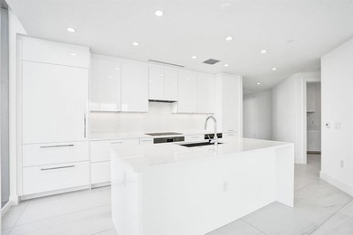 Experience elevated coastal living in this stunning residence