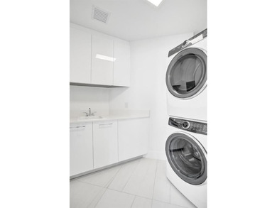 Experience elevated coastal living in this stunning residence