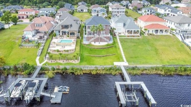 Experience luxury waterfront living in this exquisite all-brick