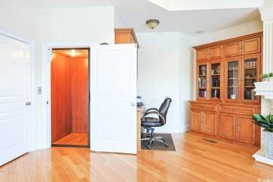 Experience luxury waterfront living in this exquisite all-brick