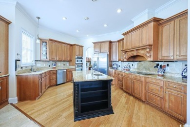 Experience luxury waterfront living in this exquisite all-brick