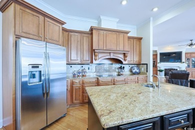 Experience luxury waterfront living in this exquisite all-brick