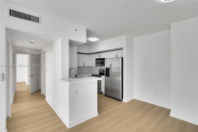 Experience elevated Brickell living in this completely renovated