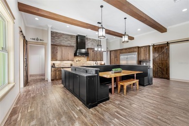 Welcome to 22220 Deer Park Avenue, a single-story custom estate