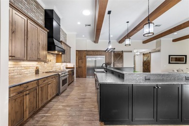 Welcome to 22220 Deer Park Avenue, a single-story custom estate