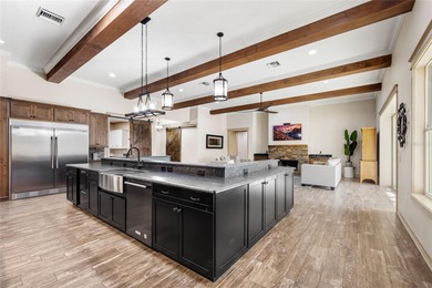 Welcome to 22220 Deer Park Avenue, a single-story custom estate