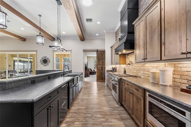 Welcome to 22220 Deer Park Avenue, a single-story custom estate