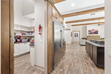 Welcome to 22220 Deer Park Avenue, a single-story custom estate