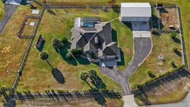 Welcome to 22220 Deer Park Avenue, a single-story custom estate