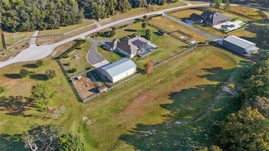 Welcome to 22220 Deer Park Avenue, a single-story custom estate