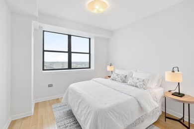 Sprawling high floor two bedroom, two bathroom condo with prime