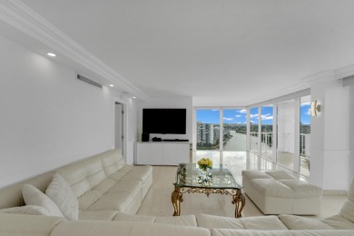 This meticulously renovated 3/2.1 penthouse offers breathtaking