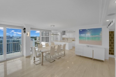 This meticulously renovated 3/2.1 penthouse offers breathtaking