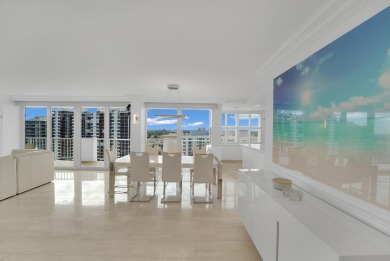This meticulously renovated 3/2.1 penthouse offers breathtaking