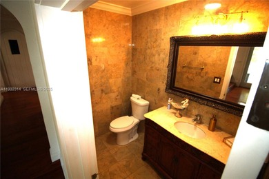 Charming waterfront living in South Coral Gables. Canal front