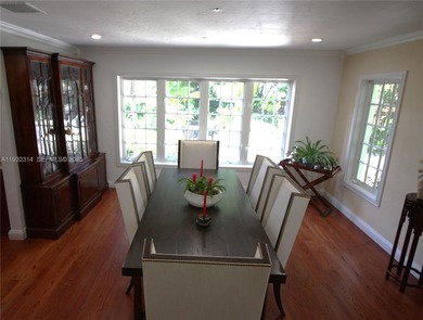 Charming waterfront living in South Coral Gables. Canal front