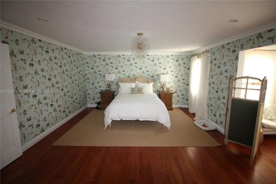 Charming waterfront living in South Coral Gables. Canal front