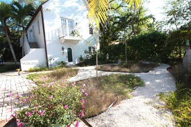 Charming waterfront living in South Coral Gables. Canal front