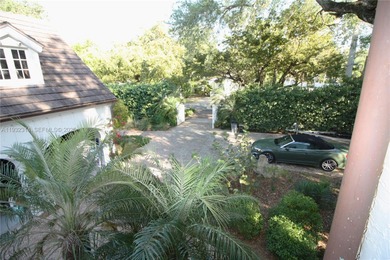 Charming waterfront living in South Coral Gables. Canal front