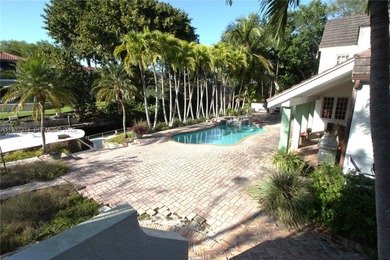 Charming waterfront living in South Coral Gables. Canal front