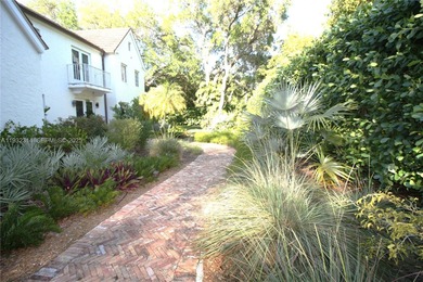 Charming waterfront living in South Coral Gables. Canal front