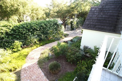 Charming waterfront living in South Coral Gables. Canal front