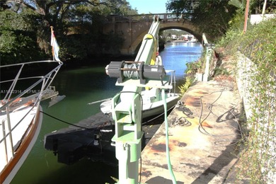 Charming waterfront living in South Coral Gables. Canal front