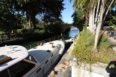 Charming waterfront living in South Coral Gables. Canal front