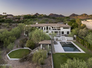 Set on a quiet acre in the heart of Paradise Valley, this