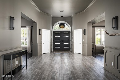 Set on a quiet acre in the heart of Paradise Valley, this