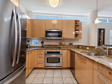 Welcome to luxurious, maintenance-free beachfront living at