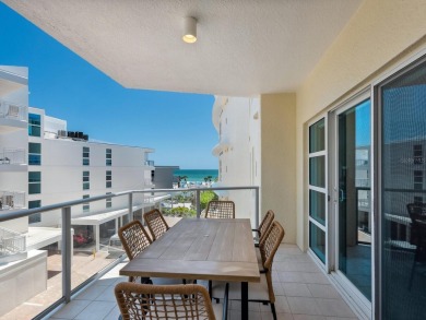 Welcome to luxurious, maintenance-free beachfront living at