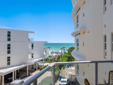 Welcome to luxurious, maintenance-free beachfront living at