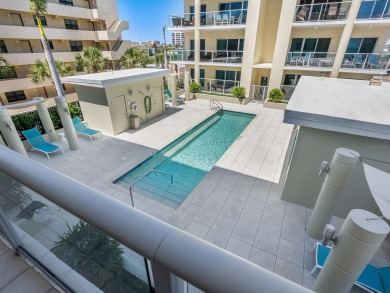 Welcome to luxurious, maintenance-free beachfront living at