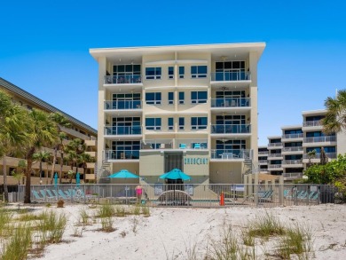 Welcome to luxurious, maintenance-free beachfront living at