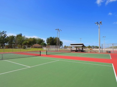 Welcome to luxurious, maintenance-free beachfront living at