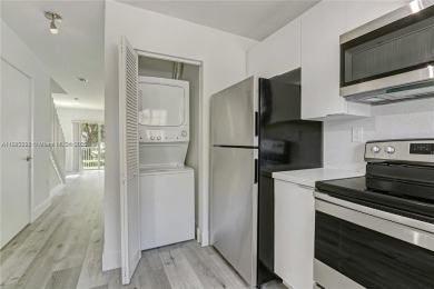 Tastefully remodeled 3 bedroom Tri-level townhouse with water