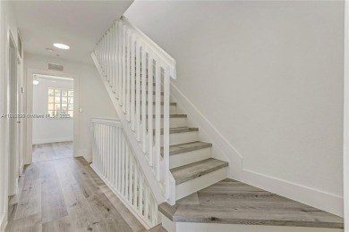 Tastefully remodeled 3 bedroom Tri-level townhouse with water