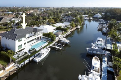 This extraordinary new-construction waterfront estate offers a