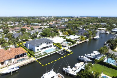 This extraordinary new-construction waterfront estate offers a