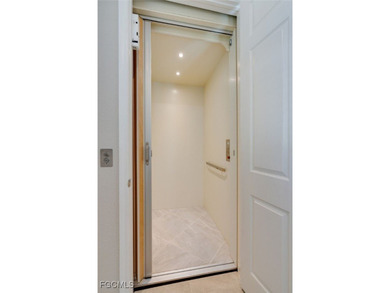 Arrive by PRIVATE ELEVATOR and step into a home that immediately