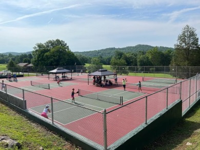 Discover the pinnacle of lakeside luxury at 97-1 Eagle Drive