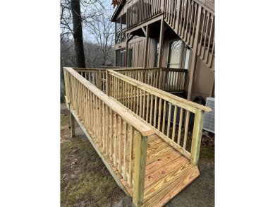 Discover the pinnacle of lakeside luxury at 97-1 Eagle Drive